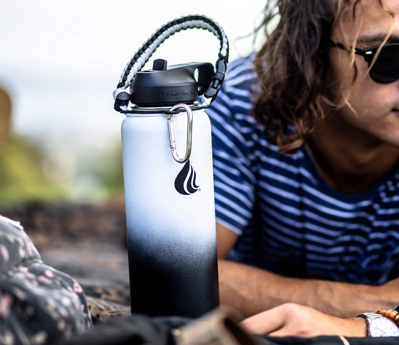 HYDRO CELL Paracord Handle for Wide Mouth Water Bottles - Carrier Strap w/Attachment Ring and Carabiner Accessory. Compatible w/ 64oz, 40oz 32oz, 24oz, 18oz, 14oz Insulated Bottles (Black/White)