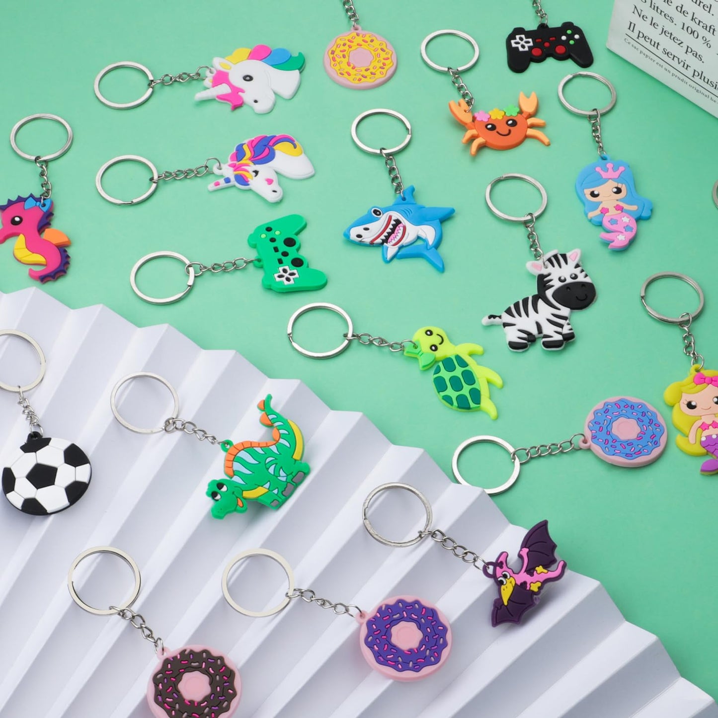 65PCs Party Favors Cartoon Keychains for Kids, Keychain Bulk for Birhtday Party, Unicorn Dinosaur Mermaid Animal Sea Dount Flower Video Ball Bulk Keychains for Party Bag Fillers Goodie Bag Stuffers